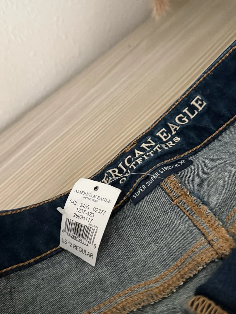 American Eagle Distressed Dark Blue Ripped Skinny Jeans size 12 Super Stretch